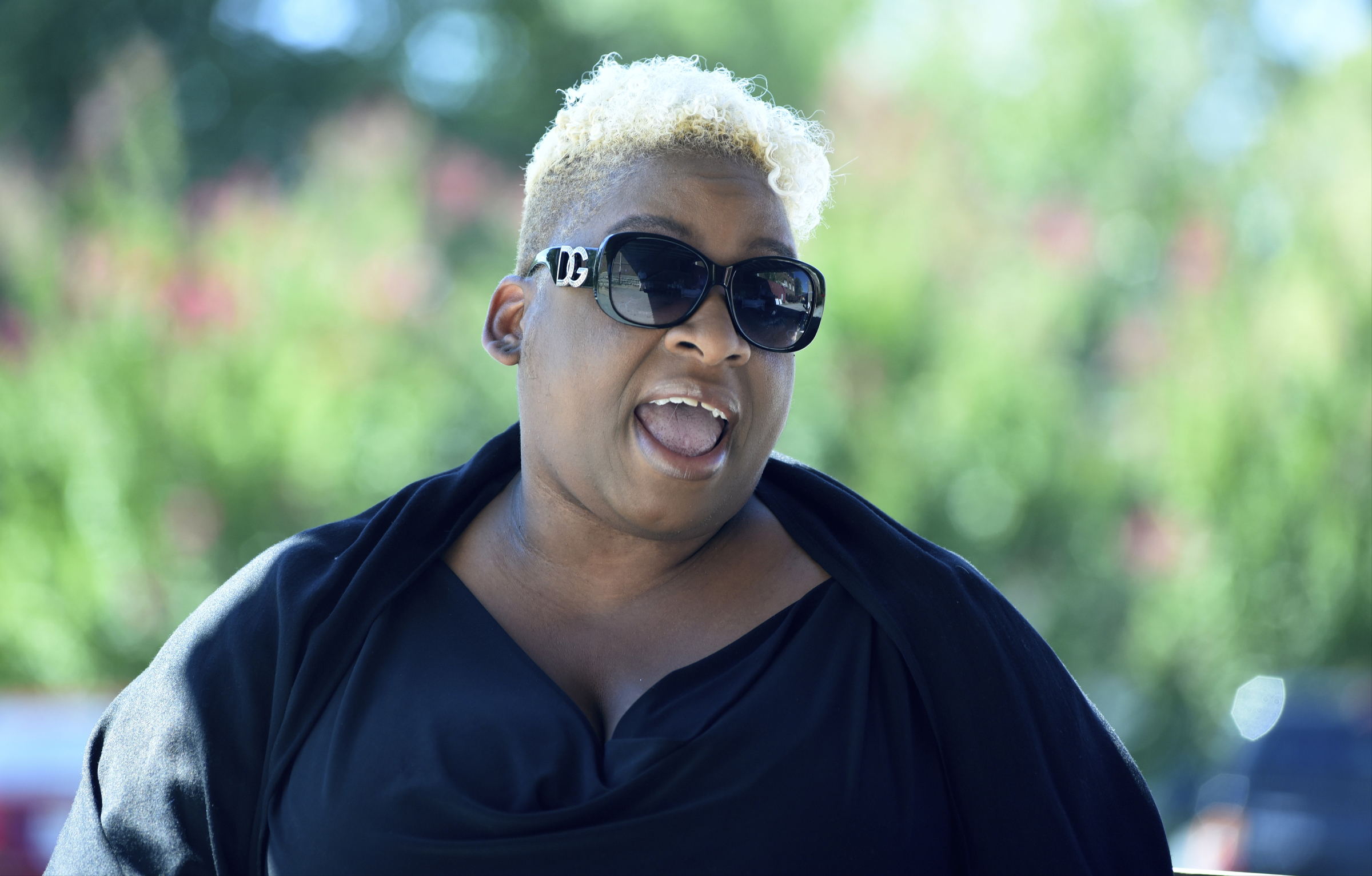 Sheshe Dance sings during lunch after a worship service at the Mercy Junction Justice and Peace Center at St. Andrews in the Highland Park community on Sunday, Sept. 13, 2015, in Chattanooga, Tenn.