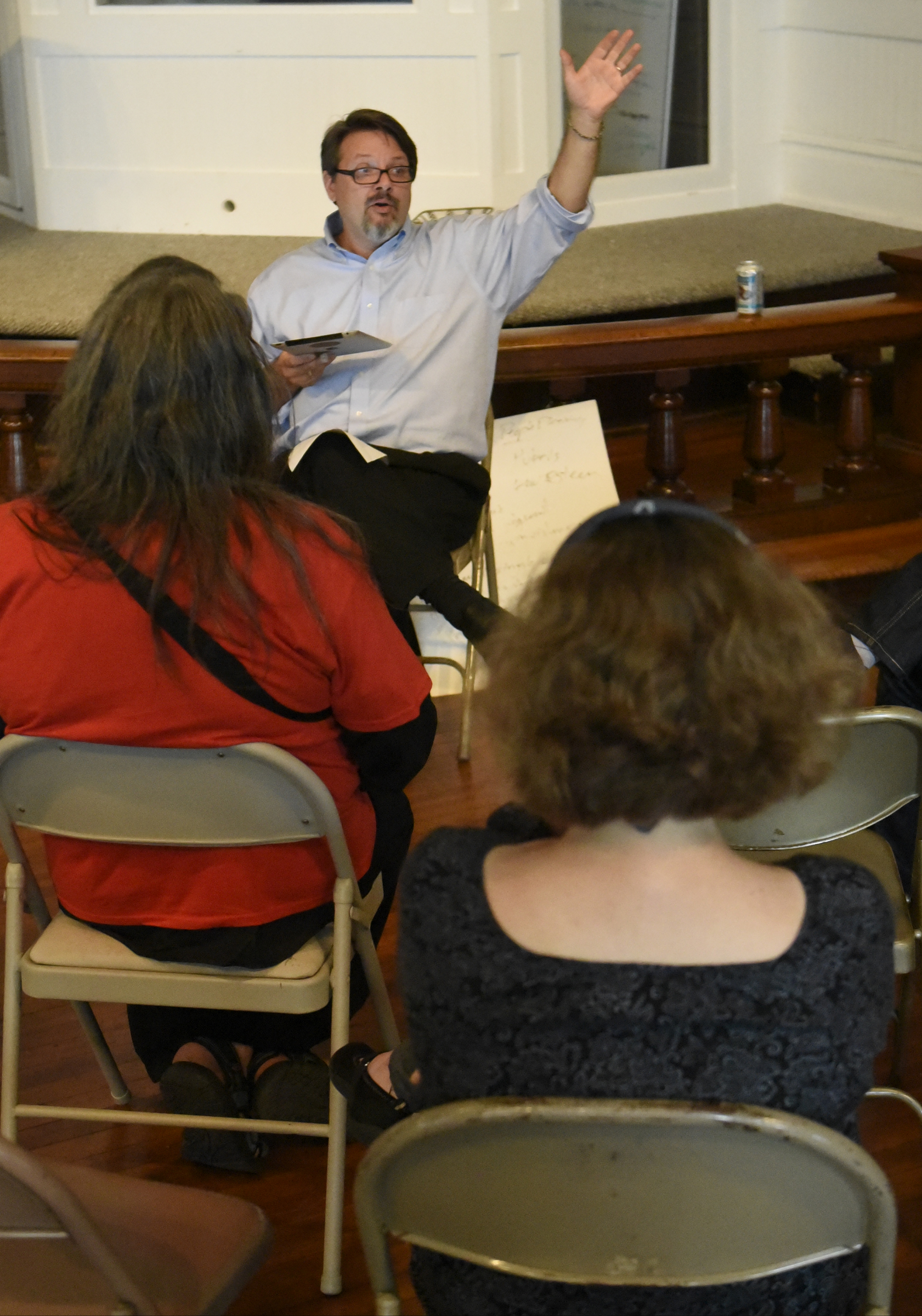 Brian Merritt leads a worship service at the Mercy Junction Justice and Peace Center at St. Andrews in the Highland Park community on Sunday, Sept. 13, 2015, in Chattanooga, Tenn.