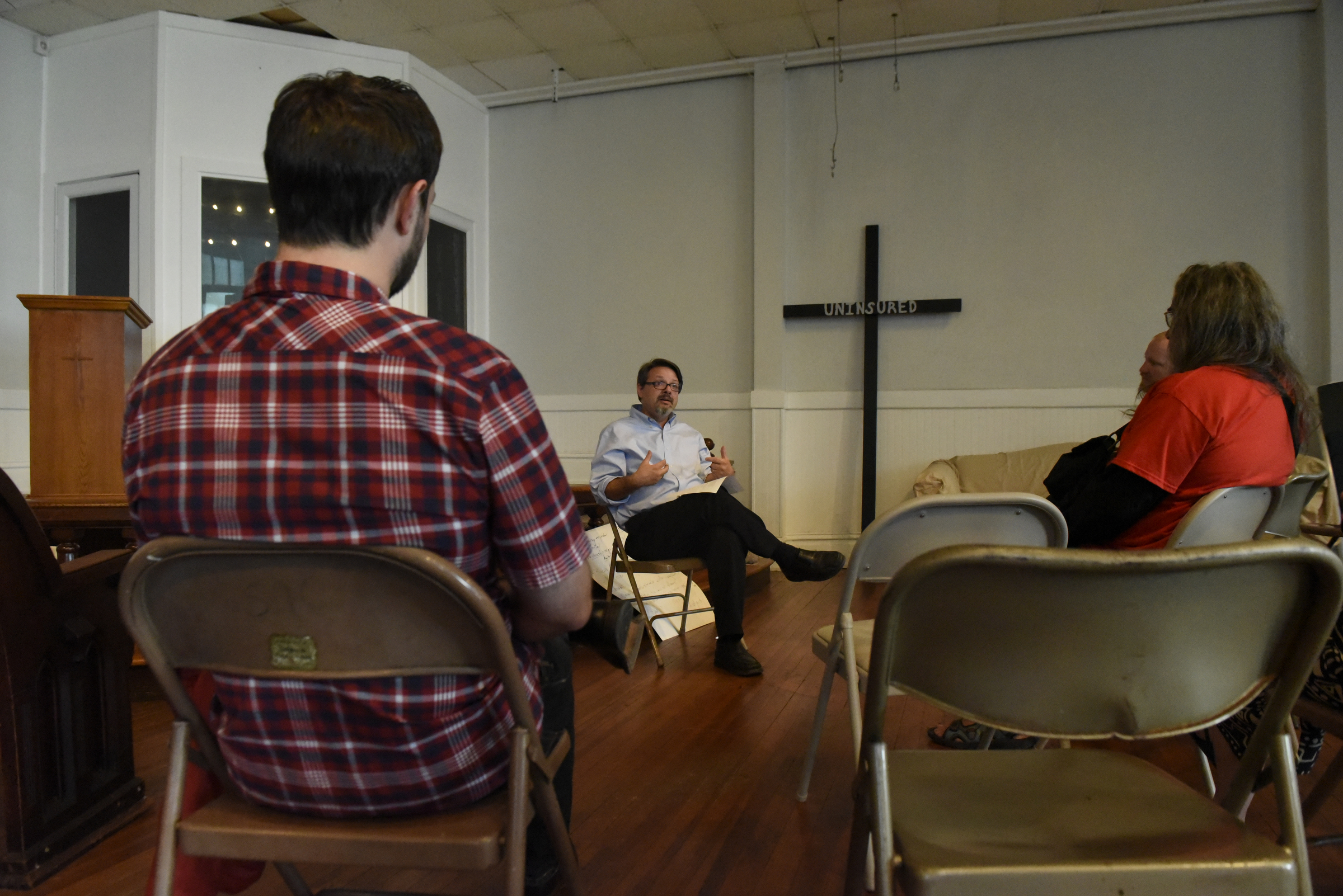 Brian Merritt leads a worship service at the Mercy Junction Justice and Peace Center at St. Andrews in the Highland Park community on Sunday, Sept. 13, 2015, in Chattanooga, Tenn.
