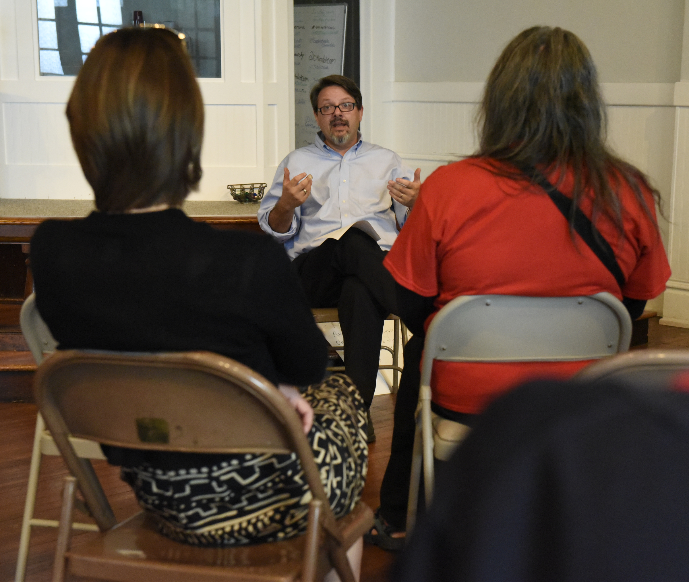 Brian Merritt leads a worship service at the Mercy Junction Justice and Peace Center at St. Andrews in the Highland Park community on Sunday, Sept. 13, 2015, in Chattanooga, Tenn.