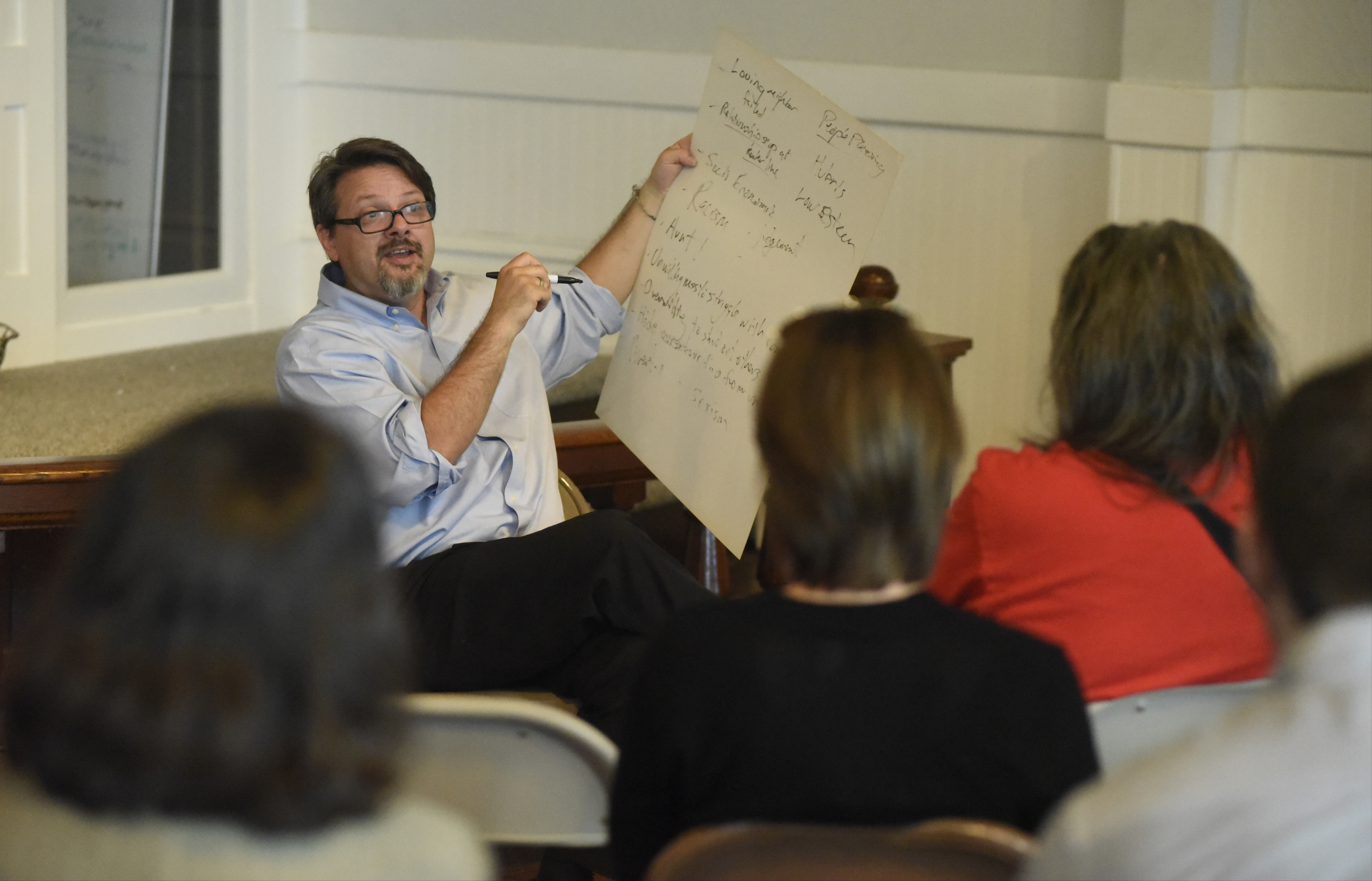 Brian Merritt leads a worship service at the Mercy Junction Justice and Peace Center at St. Andrews in the Highland Park community on Sunday, Sept. 13, 2015, in Chattanooga, Tenn.