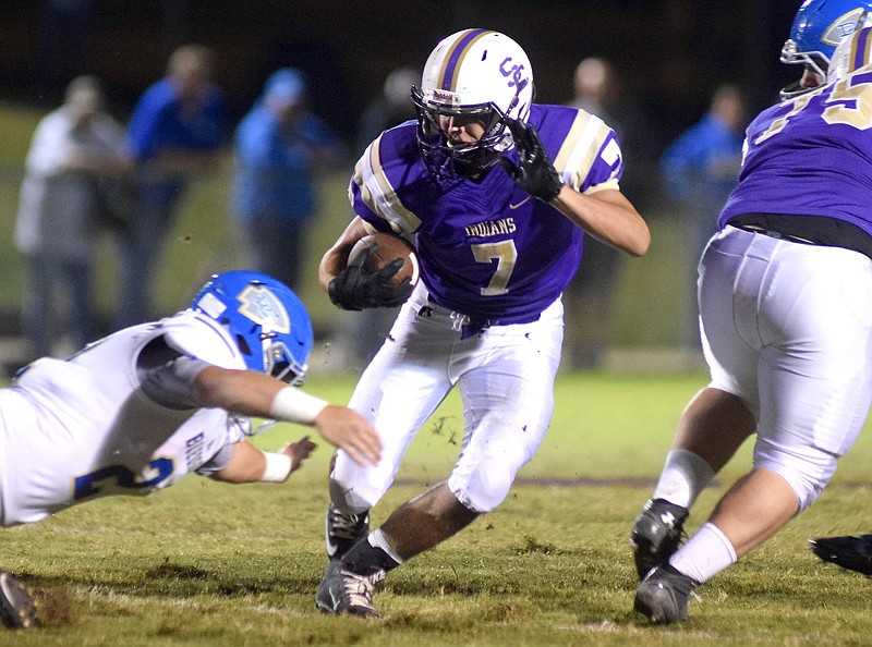 Sequatchie County's Brandon Rudd (7) cuts through the Warrior defense.  The Bledose County Warriors visited the Sequatchie County Indians in TSSAA football action Saturday September 25, 2015.