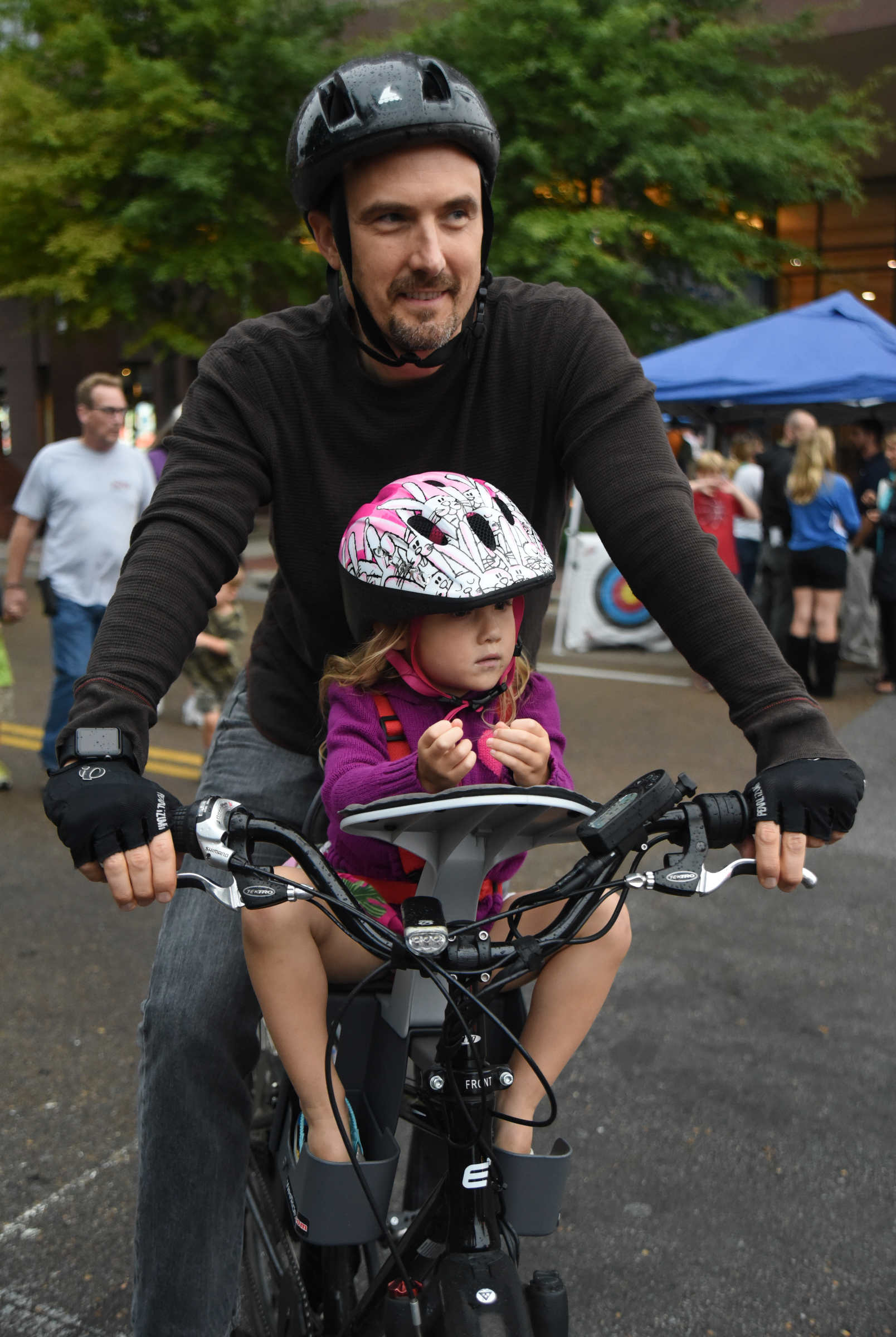 Stephen Culp and three-year-old daughter, Lily, check out the crowd during Chattanooga's 