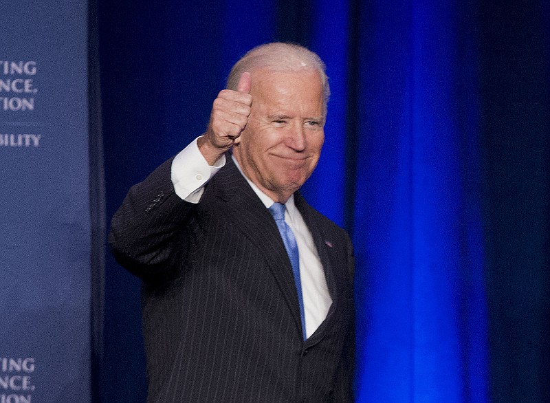 
              In this Sept. 22, 2015, photo, Vice President Joe Biden gives a 'thumbs-up' after speaking at the White House Initiative on Historically Black Colleges and Universities' (HBCU) National HBCU Week annual conference in Washington. The Human Rights Campaign says Biden will be the keynote speaker for its annual dinner. The national gay rights group is hosting the dinner Oct. 3 in Washington. The speech is a major opportunity for Biden to demonstrate his support among LGBT voters. Biden is considering running for president in 2016 but hasn’t announced a decision. (AP Photo/Pablo Martinez Monsivais)
            