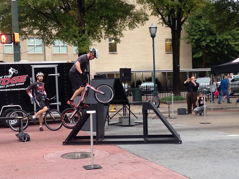 Acrobatic bikers perform stunts at the Chattanooga Best Town Ever festival on Friday, Sept. 25, 2015.