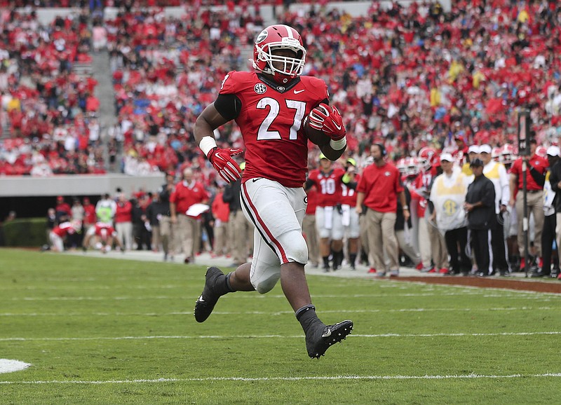 Georgia running back Nick Chubb scores one of his three touchdowns in the Bulldogs' 48-6 win over Southern.