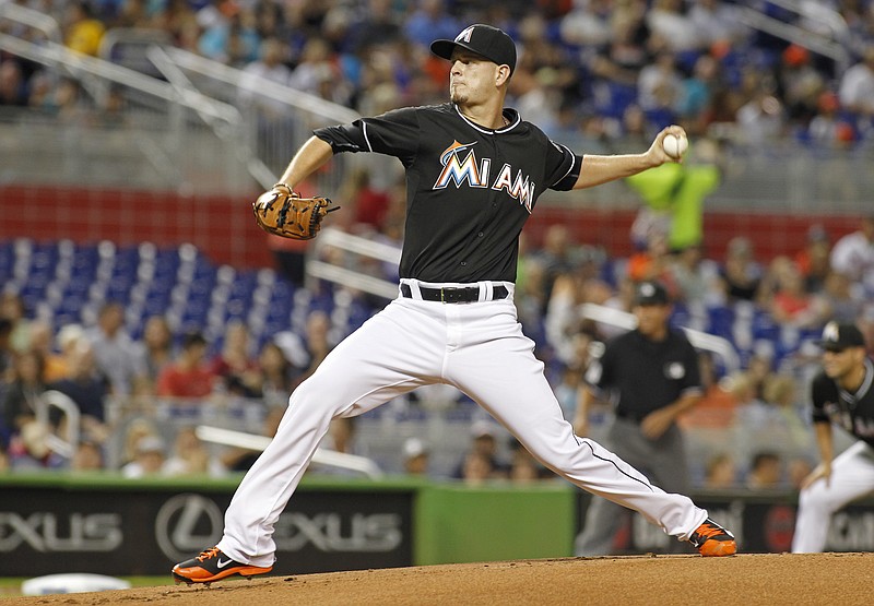 Miami Marlins starting pitcher Justin Nicolino throws against the Atlanta Braves in the first inning during a baseball game in Miami, Saturday, Sept. 26, 2015. 