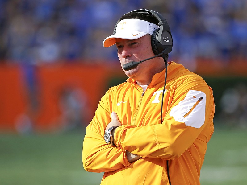 Tennessee head coach Butch Jones watches his team during the first half of an NCAA college football game against Florida, Saturday, Sept. 26, 2015, in Gainesville, Fla.