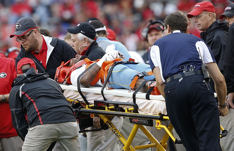 
              Southern wide receiver Devon Gales (33) is taken off the field after he was injured in the second half of an NCAA college football game against Georgia  Saturday, Sept. 26, 2015, in Athens, Ga. (AP Photo/John Bazemore)
            
