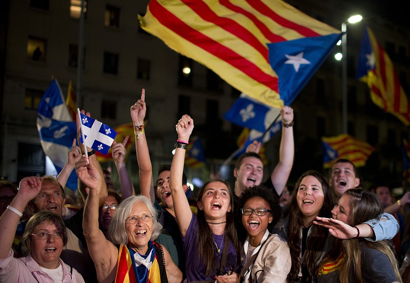 
              Catalonian pro-independence supporters celebrate in Barcelona, Spain, Sunday Sept. 27, 2015. Voters in Catalonia participated in an election Sunday that could propel the northeastern region toward independence from the rest of Spain or quell secessionism for years. (AP Photo/Emilio Morenatti)
            