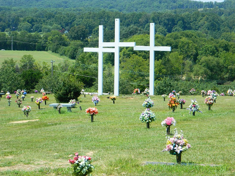 Three crosses overlook Sunset Memorial Gardens, located on a ridge on North Lee Highway in Cleveland, Tenn.