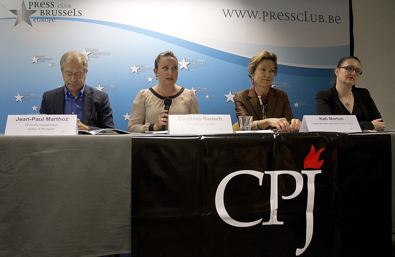 
              From left, EU correspondent for the Committee to Protect Journalists, Jean-Paul Marthoz, Advocacy Director for the CPJ, Courtney Radsch, Board member and former chairperson for the CPJ, Kati Marton and Central Asia Program Coordinator for the CPJ, Nina Ognianova address a media conference  in Brussels on Tuesday, Sept. 29, 2015. The New York-based Committee to Protect Journalists said in a report on Tuesday’s that the 28-nation bloc was struggling to match its lofty human rights standards with its day-to-day actions in protecting journalists around the world. (AP Photo/Virginia Mayo)
            