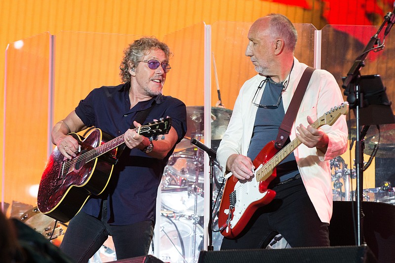 
              FILE - In this June 28, 2015 file photo, singer Roger Daltrey and Pete Townshed of the band The Who perform at the Glastonbury music festival at Worthy Farm, Glastonbury, England. The Who have announced the rescheduled dates for their axed fall tour, now kicking off in February 2016. The band said Tuesday, Sept. 29, that “The Who Hits 50!” tour will start Feb. 27 in Detroit. The band canceled their fall tour this month as lead singer Roger Daltrey recovers from viral meningitis. (Photo by Jim Ross/Invision/AP, File)
            