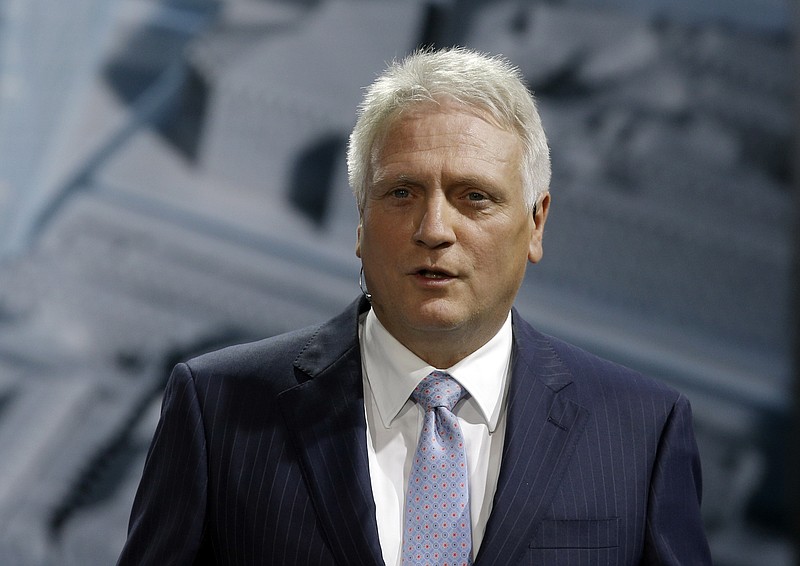 In this 2014 file photo, Winfried Vahland delivers a speech at the Volkswagen Group Gala, as part of the Paris Auto Show, in Paris.