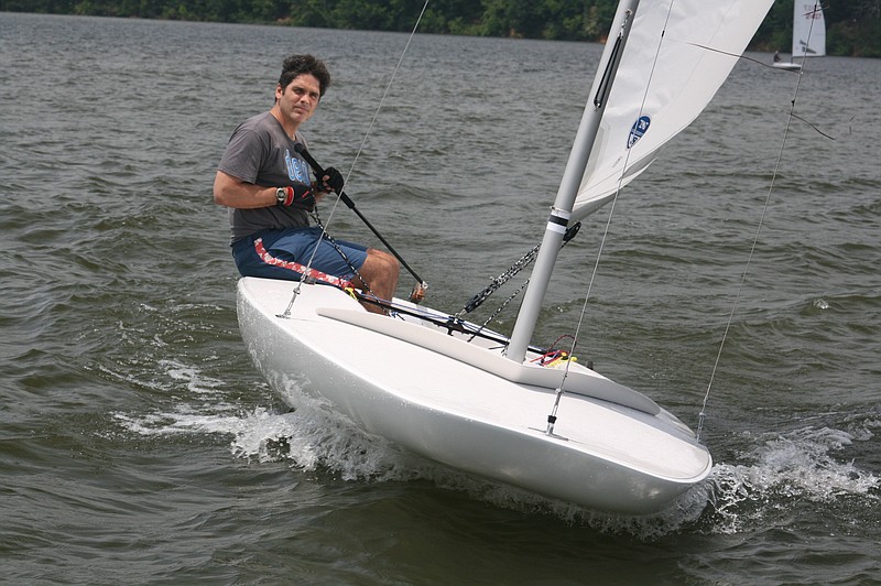 Chris Cyrul, a former Privateer Yacht Club commodore and a founder of the local MC fleet, sails one of the racing boats in Chickamauga Lake