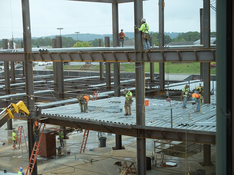 Steel construction of the new patient tower at Erlanger East Hospital is taking shape in this Sept 28, 2015 photo. The design is patterned after area mountains, according to artist renderings in the lobby of the outpatient center.