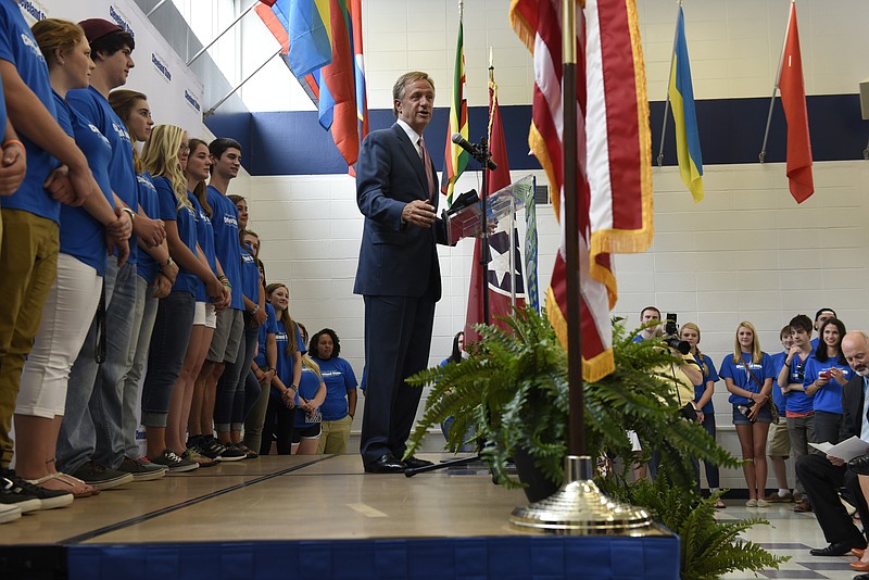 Tennessee Gov. Bill Haslam speaks as he visits the Cleveland State Community College campus on Aug. 24. The students on stage with the governor are Tennessee Promise honor students.