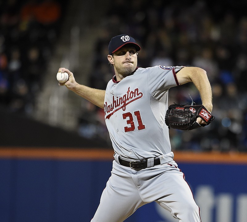 Washington Nationals starter Max Scherzer (31) pitches against the New York Mets in the first inning of the second baseball game of a doubleheader, Saturday, Oct. 3, 2015, in New York.