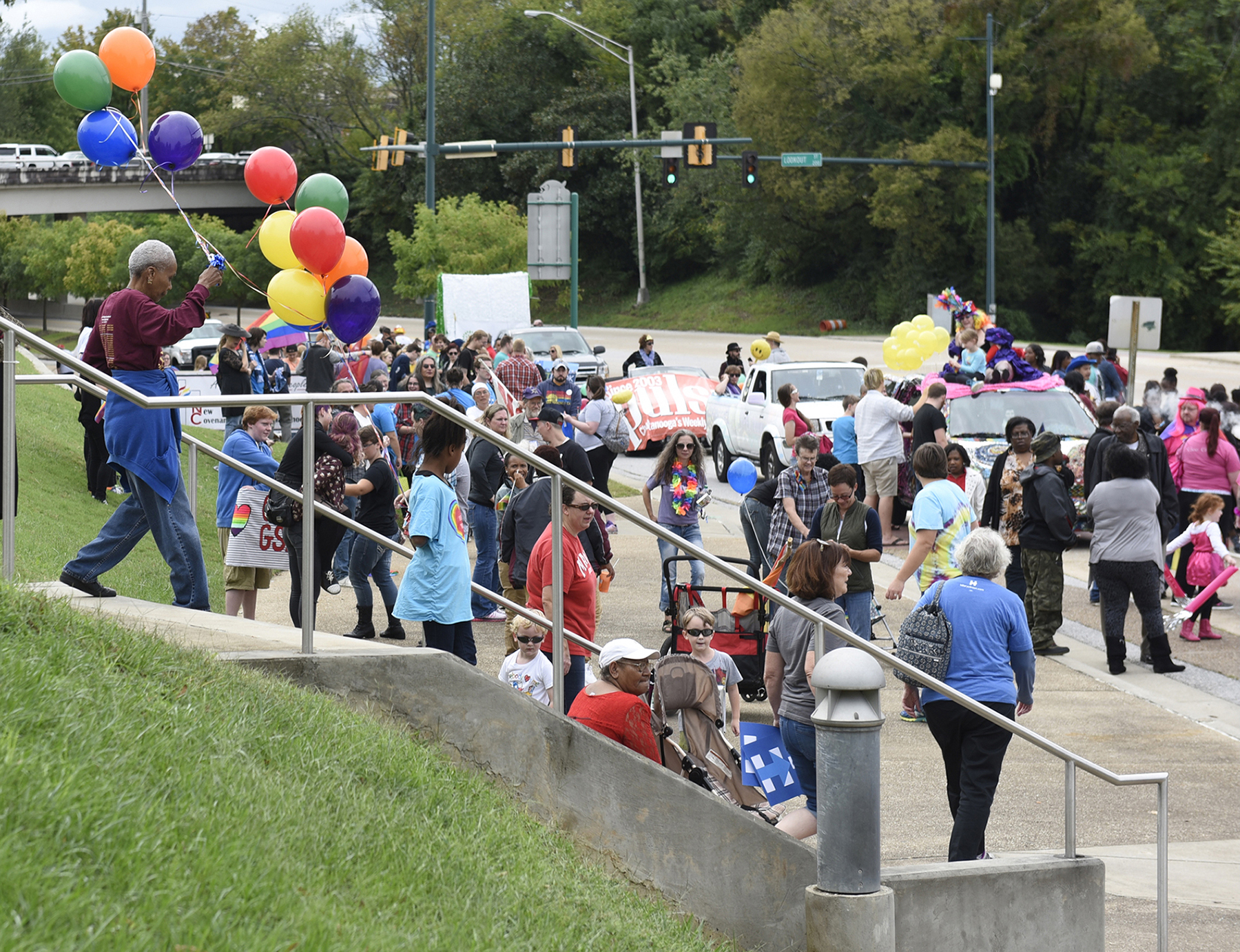 People gather for the Chattanooga Pride Festival parade on Riverfront Parkway on Sunday, Oct. 4, 2015., in Chattanooga, Tenn.