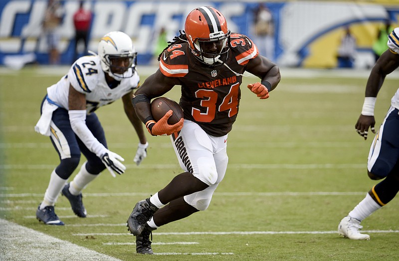 
              Cleveland Browns running back Isaiah Crowell (34) stays inbounds after getting past San Diego Chargers cornerback Brandon Flowers (24) during the second half in an NFL football game Sunday, Oct. 4, 2015, in San Diego. (AP Photo/Denis Poroy)
            