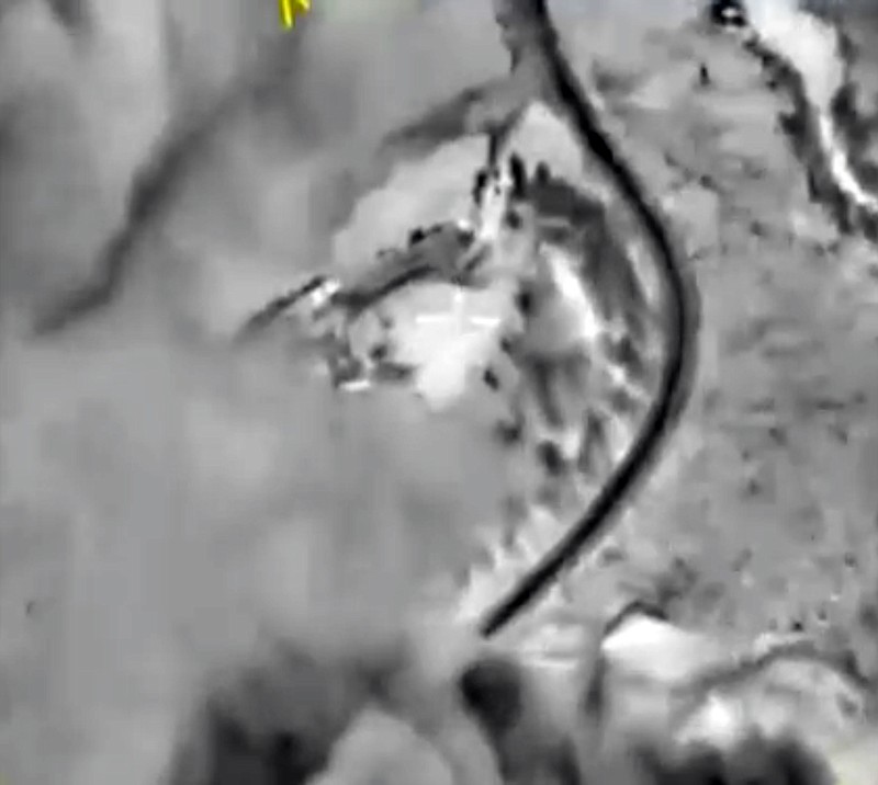 
              In this photo made from footage taken from Russian Defense Ministry official web site on Saturday, Oct. 3, 2015 a bomb explosion is seen in Syria. Pentagon officials urged the Russian military on Thursday to focus its airstrikes in Syria on Islamic State fighters rather than opponents of Syrian President Bashar Assad, U.S. administration officials said. (Russian Defense Ministry Press Service via AP)
            