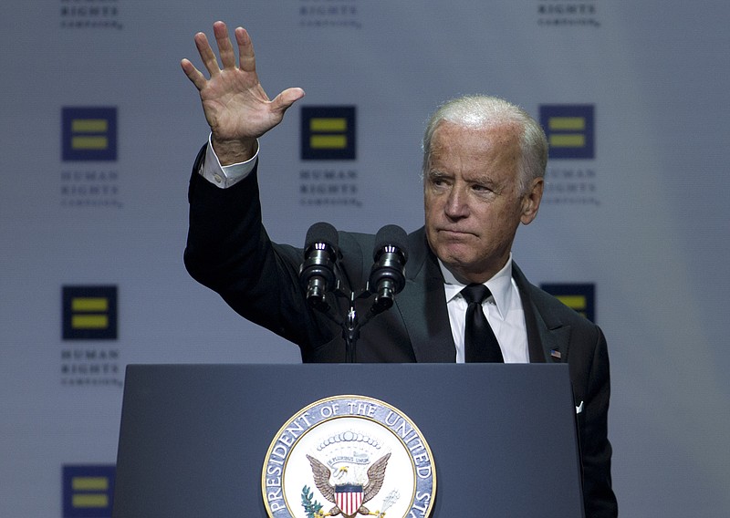 
              Vice President Joe Biden waves to the crowd after he speaks, during Human Rights Campaign National Dinner at  Walter E. Washington Convention Center, in  Washington, Saturday, Oct. 3, 2015. ( AP Photo/Jose Luis Magana)
            