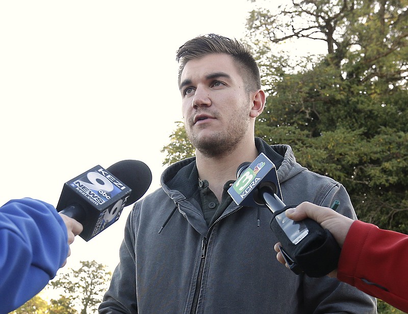 
              FILE - In this Friday, Oct. 2, 2015 file photo, Alek Skarlatos, one of the three Americans who stopped a terrorist attack aboard a Paris-bound train in August, talks to reporters about the shooting at Umpqua Community College, in Roseburg, Ore. Skarlatos is back on TV’s "Dancing with the Stars," days after the mass shooting at his Oregon college. On the Monday, Oct. 5, 2015 episode, an emotional Skarlatos dedicated his performance to the community of Roseburg, Ore., where nine people were killed last Thursday. (AP Photo/Rich Pedroncelli, File)
            