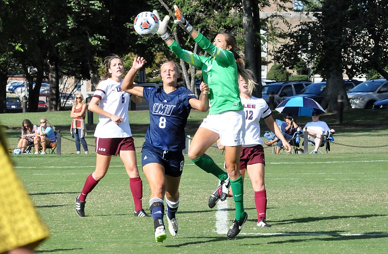 Lee University goalkeeper Haley Gribler goes high for a save. She was the Gulf South Conference women's soccer defensive player of the week, while Lee's David Perez was the men's offensive honoree.