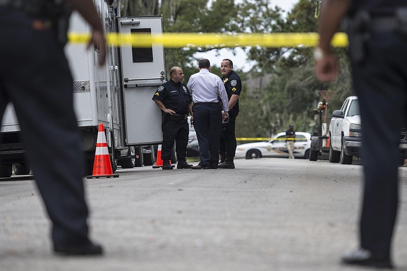 
              Savannah Chatham Police investigate the killing of two small children who were allegedly drowned by their mother Tuesday, Oct. 6, 2015 in Savannah, Ga. (Josh Galemore/Savannah Morning News via AP)
            