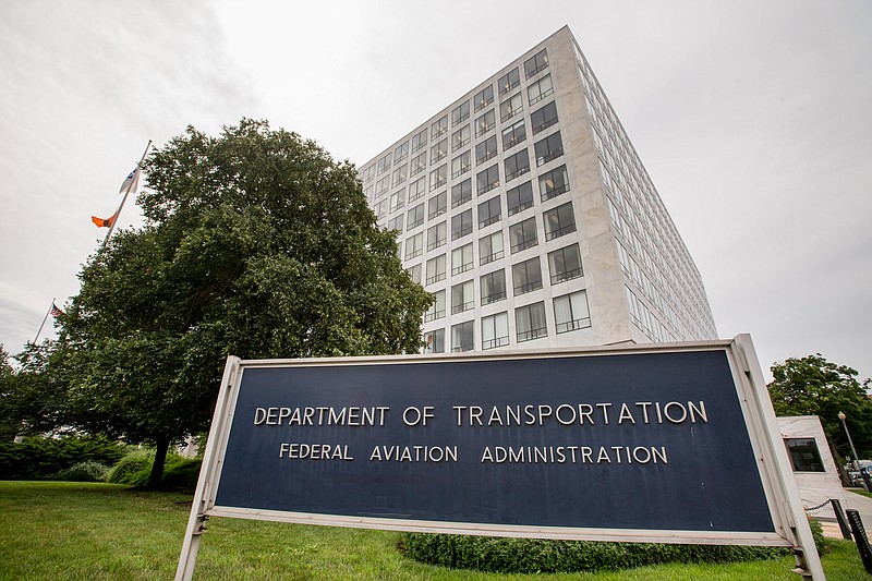 
              In this photo taken June 19, 2015, the Transportation Department's Federal Aviation Administration (FAA) building in Washington. The FAA proposed a record $1.9 million fine Tuesday against an aerial photography company for flying drones in crowded New York and Chicago airspace without permission. (AP Photo/Andrew Harnik)
            