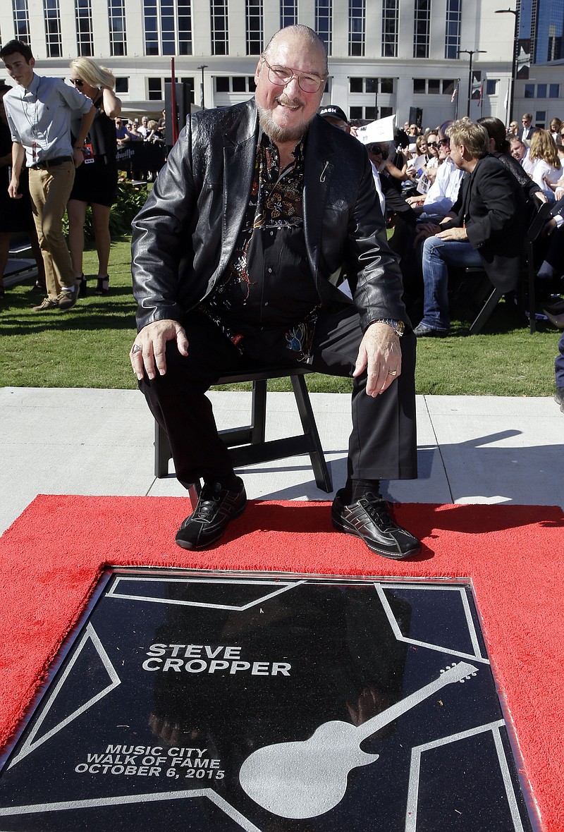 
              Famed guitar player and songwriter Steve Cropper is presented with his star on the Music City Walk of Fame Tuesday, Oct. 6, 2015, in Nashville, Tenn. Cropper was a member of Booker T and the MG’s and one of the stars at Stax Records. (AP Photo/Mark Humphrey)
            