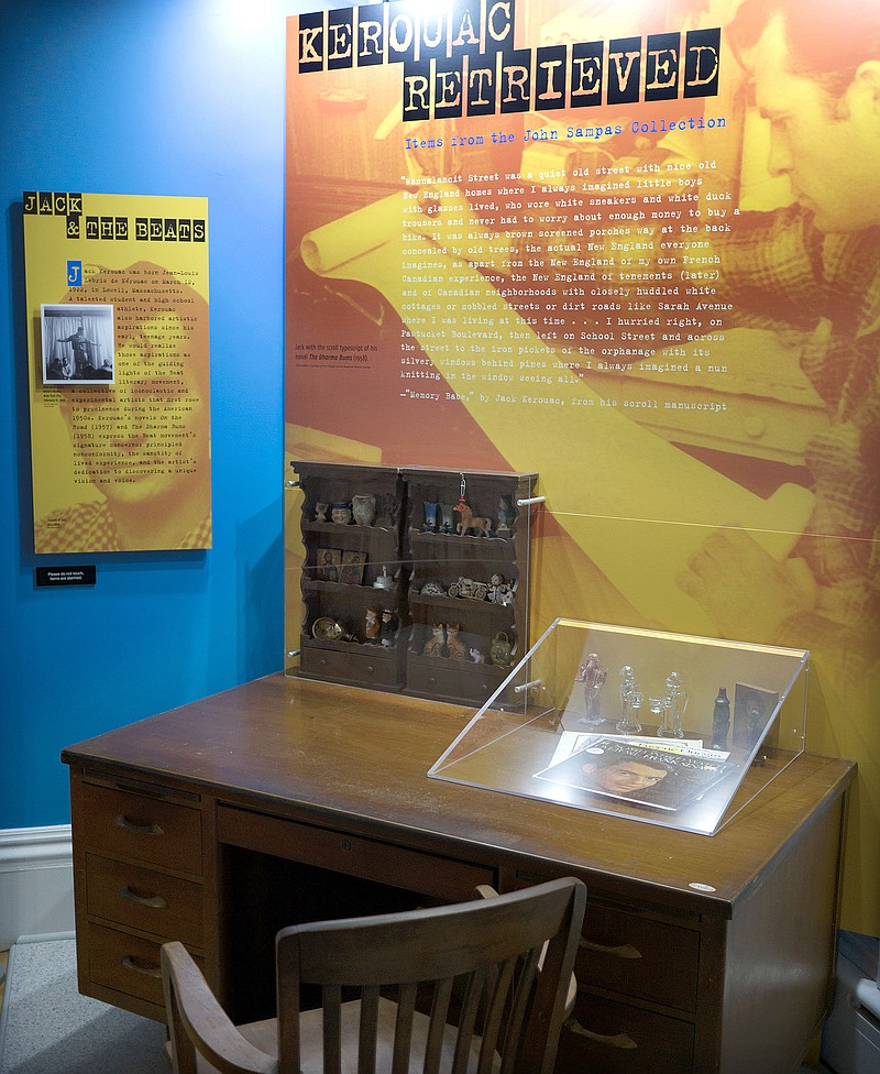 
              In this Sept. 18, 2015 photo provided by the University of Massachusetts, Lowell, some of author Jack Kerouac's belongings, including a Frank Sinatra album and collection of figurines, are displayed on the desk where he once wrote, in the exhibit “Kerouac Retrieved: Items from the John Sampas Collection,” at the university in Lowell, Mass. The exhibit opens in Kerouac's hometown on Thursday, Oct. 8. (Tory Germann/University of Massachusetts Amherst, Lowell via AP)
            