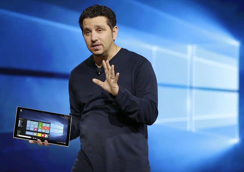 
              Microsoft vice president for Surface Computing Panos Panay talks about the new Surface Pro 4 tablet during a presentation, in New York, Tuesday, Oct. 6, 2015. The Surface Pro 4 tablet is faster and thinner than before, yet it comes with a slightly larger screen at 12.3 inches. (AP Photo/Richard Drew)
            
