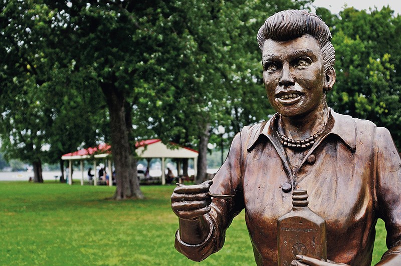 
              FILE - In this Aug. 2012 photo, a bronze sculpture of Lucille Ball is displayed in Lucille Ball Memorial Park in the village of Celoron, N.Y. The statue that drew worldwide scorn earlier this year for its unflattering depiction of the “I Love Lucy” star will be placed at the Chautauqua Mall in neighboring Lakewood, N.Y., as part of the shopping center’s annual haunted house event.  (AP Photo/The Post-Journal)  BUFFALO OUT
            