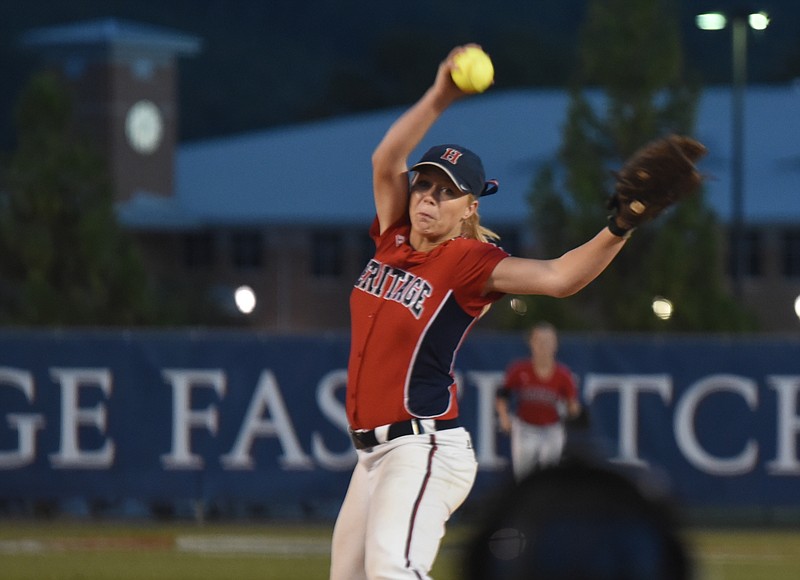 Heritage pitcher Madi Morris winds to deliver in the second game of a double-header against Northwest Whitfield Wednesday night.