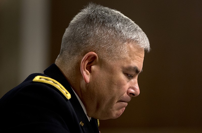 
              U.S. Forces-Afghanistan Resolute Support Mission Commander Gen. John Campbell pauses as he testifies on Capitol Hill in Washington, Tuesday, Oct. 6, 2015, before the Senate Armed Services Committee hearing on the Situation in Afghanistan. U.S. forces attacked a hospital in northern Afghanistan last weekend, killing at least 22 people, despite "rigorous" U.S. military procedures designed to avoid such mistakes, the top commander of U.S. and allied forces in Afghanistan said Tuesday. (AP Photo/Carolyn Kaster)
            