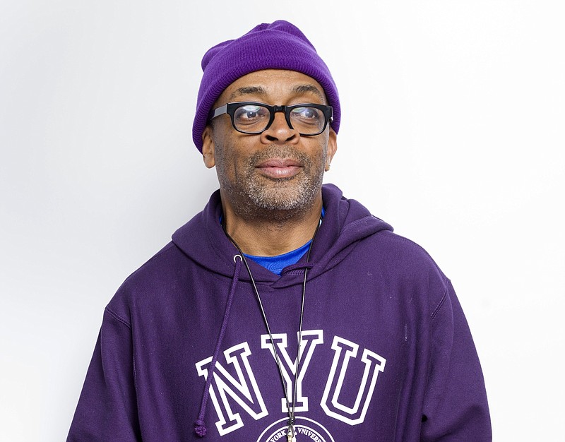 
              FILE - In this Jan. 25, 2015 file photo, writer-director Spike Lee poses for a portrait during the Sundance Film Festival in Park City, Utah. Filmmaker, teacher, honorary Oscar winner, and crazy New York sports fan, Lee is the next grand marshal of the New York City Marathon, race officials announced, Monday, Oct. 5, 2015. (Photo by Victoria Will/Invision/AP, File)
            