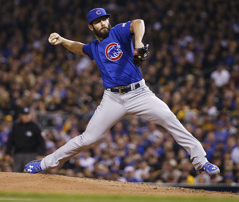 Chicago Cubs starting pitcher Jake Arrieta throws against the Pittsburgh Pirates in the first inning of the National League wild card baseball game, Wednesday, Oct. 7, 2015, in Pittsburgh.