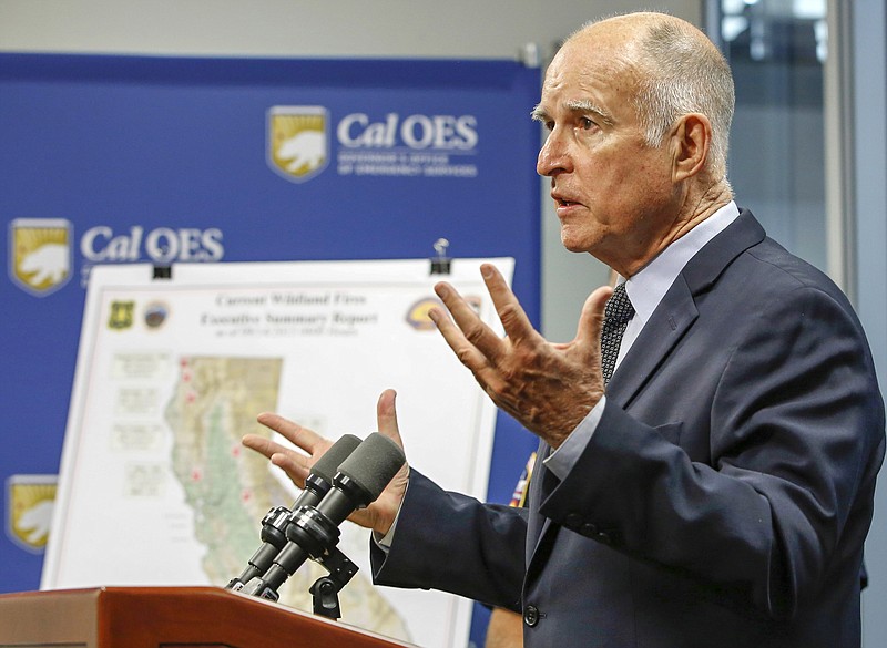 
              FILE - In this Sept. 14, 2015, file photo, Calif. Gov. Jerry Brown discuss the state's wildfire situation at the Governor's Office of Emergency Services news conference in Rancho Cordova, Calif. Gov. Brown signed legislation, Monday, Oct. 5, 2015, allowing terminally ill people in the nation's most populous state to take their lives, saying the emotionally charged bill forced him to consider "what I would want in the face of my own death." Brown, a lifelong Catholic and former Jesuit seminarian, said he acted after discussing the issue with many people, including a Catholic bishop and two of his doctors. (AP Photo/Rich Pedroncelli, file)
            