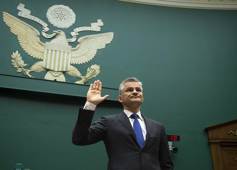 Volkswagen America CEO Michael Horn, is sworn-in on Capitol Hill on Thursday in Washington prior to testifying before the House Oversight and Investigations subcommittee hearing on Volkswagen's emissions cheating allegations.