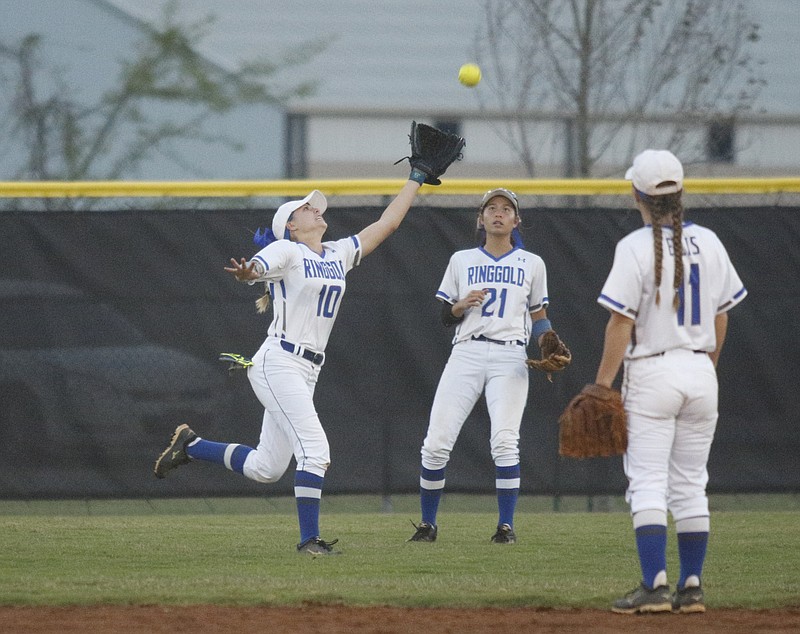 Ringgold center fielder Karoline Sholl catches a fly ball during their prep softball region tournament game Thursday, Oct. 8, 2015, at Jack Mattox Recreational Complex in Ringgold, Ga.