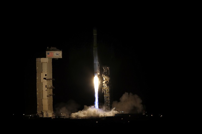 
              An Atlas V rocket carrying 13 CubeSats launches from Space Launch Complex-3 on Thursday, Oct. 8, 2015 at Vandenberg Air Force Base, Calif.  The payload is for the National Reconnaissance Office as part of its NROL-55 mission, as well as several mini-satellites for the NRO and NASA. The miniature satellites provide a low-cost platform for NASA missions, and provide an inexpensive means to engage students in satellite development, operation, and exploitation.  (Daniel Dreifuss/The Santa Maria Times via AP) MANDATORY CREDIT
            