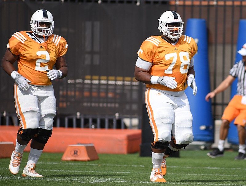 Shy Tuttle (2), shown during spring practice with Charles Mosley (78), has been impressive along with fellow freshman defensive tackle Kahlil McKenzie in recent Tennessee games.