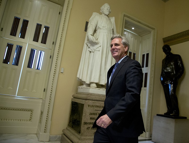 House Majority Leader Kevin McCarthy of Calif. walks towards the House Chamber on Capitol Hill in Washington on Friday.