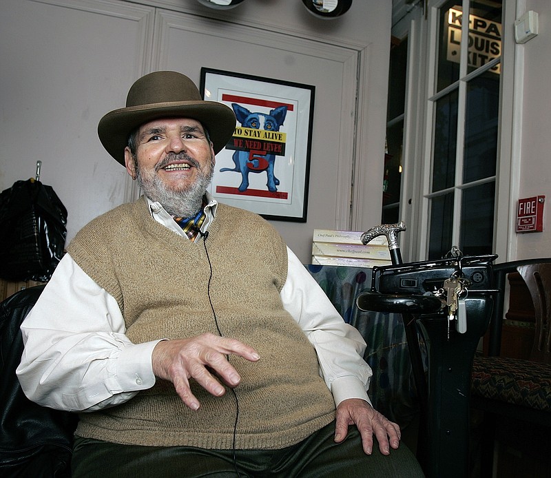 
              FILE -In this Friday, Feb. 2, 2007 file photo, chef Paul Prudhomme gestures during an interview at his French Quarter restaurant, K-Paul's Louisiana Kitchen, in New Orleans. Prudhomme, the Cajun who popularized spicy Louisiana cuisine and became one of the first American restaurant chefs to achieve worldwide fame, died Thursday, Oct. 7, 2015. He was 75. (AP Photo/Bill Haber, File)
            