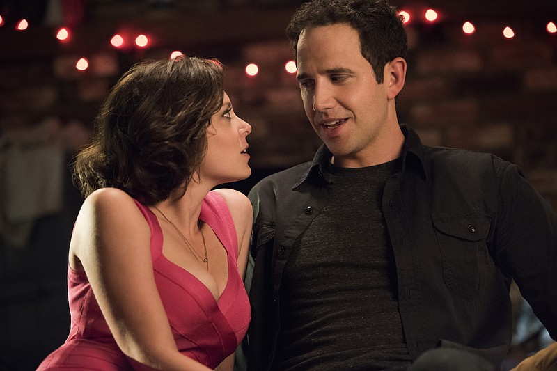 
              This photo provided by The CW shows, Rachel Bloom, left, as Rebecca Bunch and Santino Fontana as Greg Serrano, in a scene from the pilot for "Crazy Ex-Girlfriend." The show debuts Oct. 12, 2015. (Eddy Chen/The CW via AP)  MANDATORY CREDIT; NORTH AMERICAN USE ONLY
            