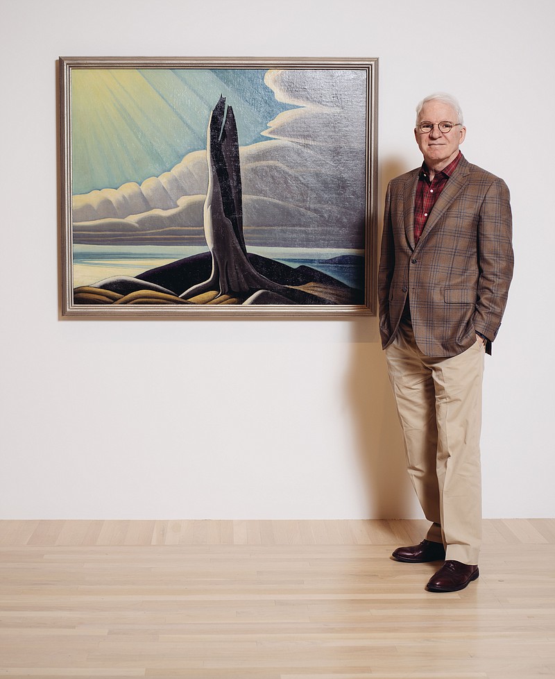 
              In this Wednesday, Oct. 7, 2015,  photo, curator and actor-comedian Steve Martin poses for a portrait in a gallery for the exhibit "The Idea of North: The Paintings of Lawren Harris" at The Hammer Museum in Los Angeles. The man who brought bluegrass music to mainstream audiences and introduced the banjo and balloon animals to comedy routines has a new passion: He wants to imbue in U.S. audiences the same deep admiration he has for the works of Lawren Harris, arguably Canada's most revered artist and one almost completely unknown in the U.S. The show, which travels to Boston’s Museum of Fine Arts and Canada’s Art Gallery of Ontario next year, opens Sunday, Oct. 11, 2015. (Photo by Casey Curry/Invision/AP)
            