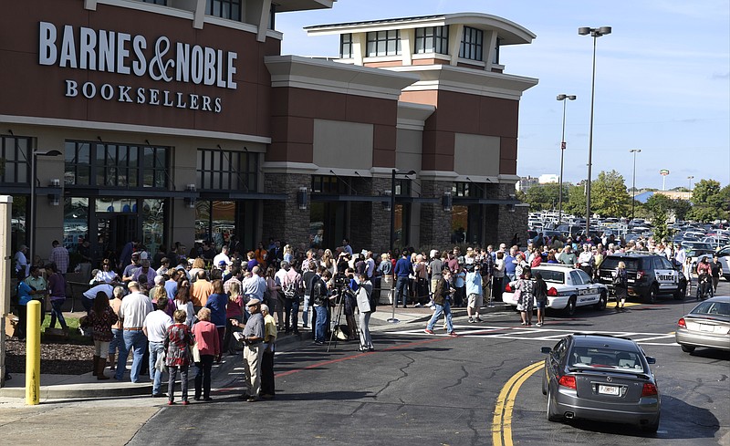 People line up from the front of the Barnes and Noble bookstore to beyond the main mall entrance as Republican presidential candidate Dr. Ben Carson meets supporters at a book signing at the bookstore at the Hamilton Place Mall on Sunday, Oct. 11, 2015, in Chattanooga, Tenn. 
