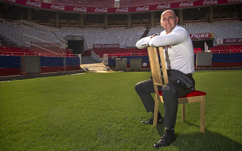 
              In this Thursday, Oct. 6, 2011 photo, Ramon Rodriguez Verdejo "Monchi" poses for a photo at the Ramon Sanchez Pizjuan stadium, in Seville, Spain. Verdejo, who still goes by the nickname from his goalkeeping days, has become one of the most sought-after football directors in European soccer after revolutionizing Spanish club Sevilla with a scouting system that helped rescue the team from the brink of financial collapse and turned it into a perennial contender in the continent’s second-tiered competitions. (AP Photo/Miguel Angel Morenatti)
            