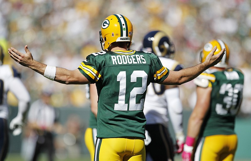 
              Green Bay Packers' Aaron Rodgers reacts during the first half an NFL football game against the St. Louis Rams Sunday, Oct. 11, 2015, in Green Bay, Wis. (AP Photo/Matt Ludtke)
            